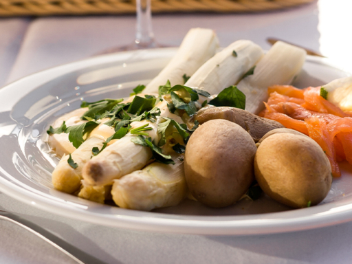 A main course with asparagus, potatoes and salmon.