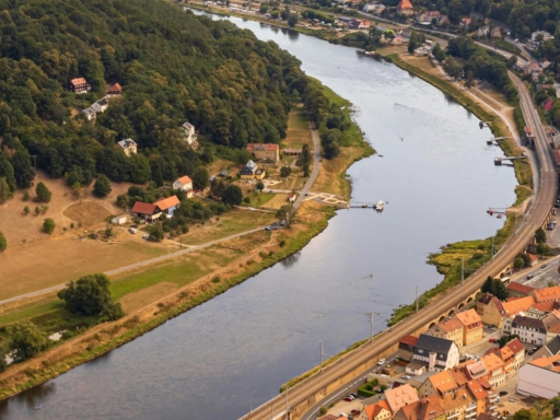 View from Königstein Fortress towards the Elbe Valley and the Czech border.<br>The town center of Königstein is visible, including the railway line and the train station.” title=”Königstein” loading=”lazy”></picture></figure></div></article></li><li><article id=